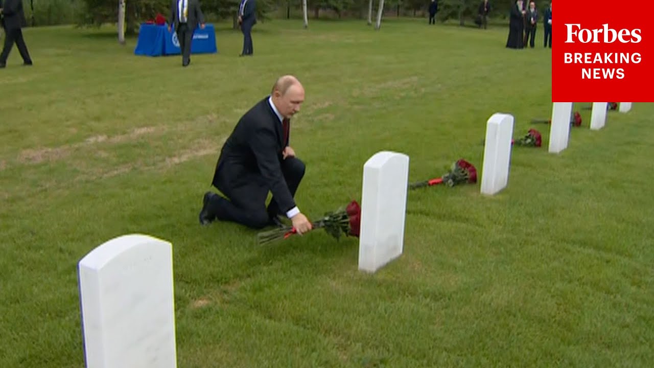 Putin Lays Flowers At Soviet Soldier Graves At Fort Richardson Memorial Cemetery After Trump Meeting