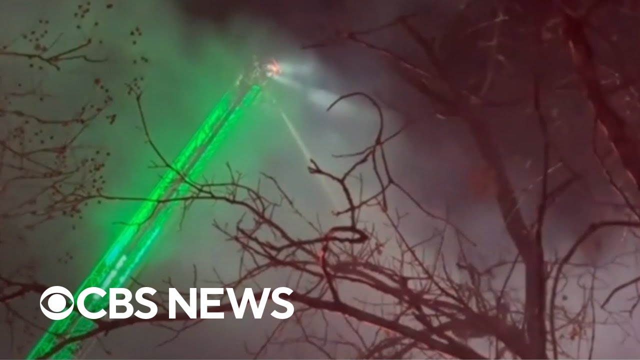 Suspect in Arlington, Virginia, house explosion may have shot at officers trying to serve warrant