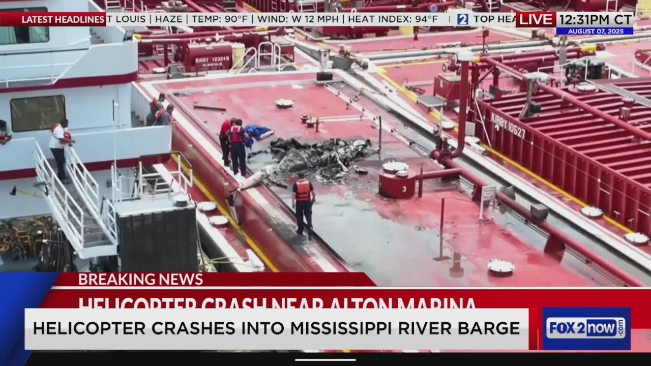 Helicopter crashes into Mississippi River barge