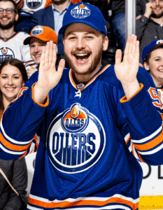 edmonton oilers fan flashes crowd